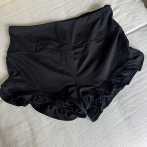 Free People Movement, Plie All Day ruffle shorts in Black, size L.